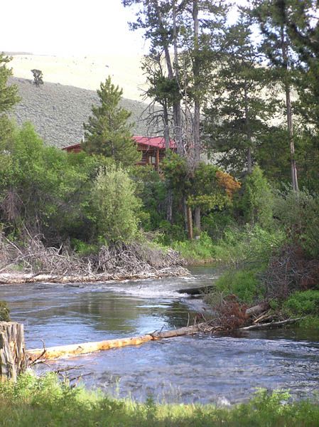 Cabin overlooking creek. Photo by Pinedale Online.