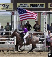 Presenting the flag. Photo by Pinedale Online.