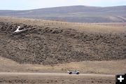 Running to the hilltop. Photo by Clint Gilchrist, Pinedale Online.