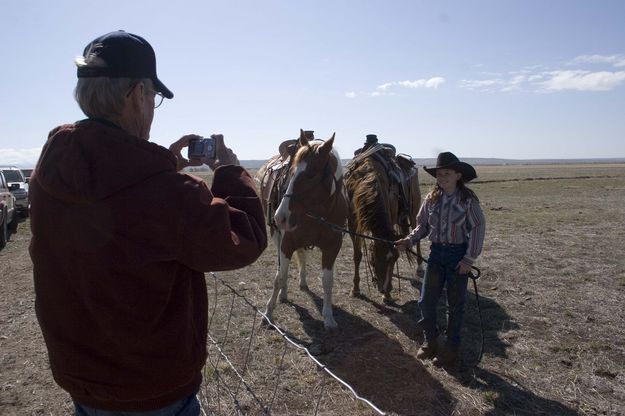 A proud grandfather captures his granddaughter, Erika with her beloved horses. Photo by Tara Bolgiano.