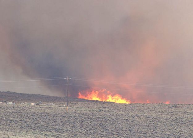 Flames near town. Photo by Dave Bell.