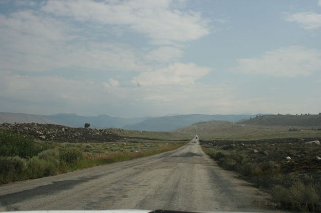 Fire crossed road to lake. Photo by Dawn Ballou, Pinedale Online.