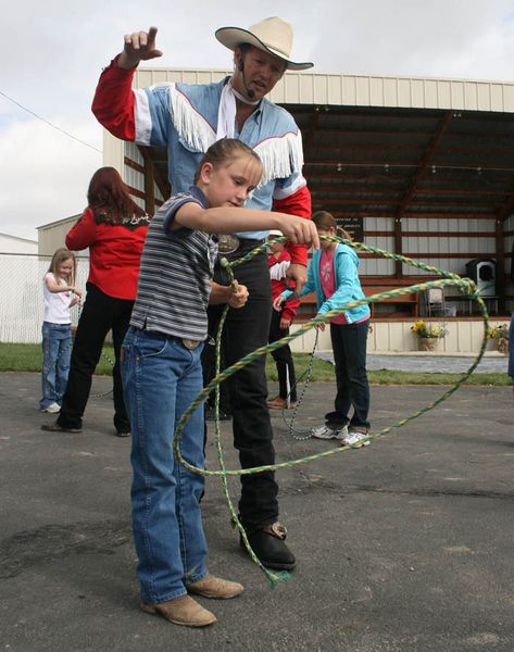 Showing how to twirl. Photo by Dawn Ballou, Pinedale Online.