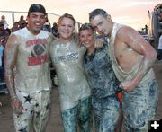 Covered in Mud. Photo by Tara Bolgiano, Blushing Crow Photography.