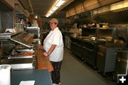 Dourthea in the kitchen. Photo by Dawn Ballou, Pinedale Online.
