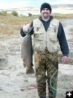 Craig and his big fish. Photo by Randy Davis.