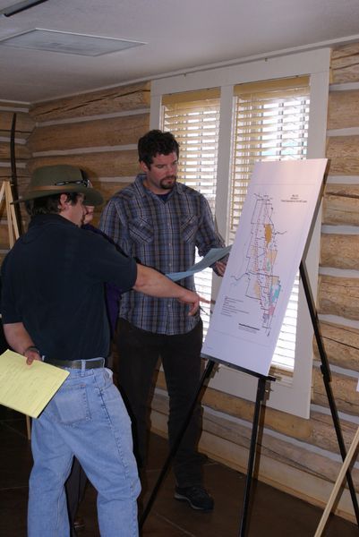 Discussing Maps. Photo by Cat Urbigkit, Pinedale Online.