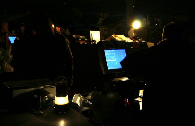 Shopping by lantern light. Photo by Alecia Warren, Pinedale Roundup.