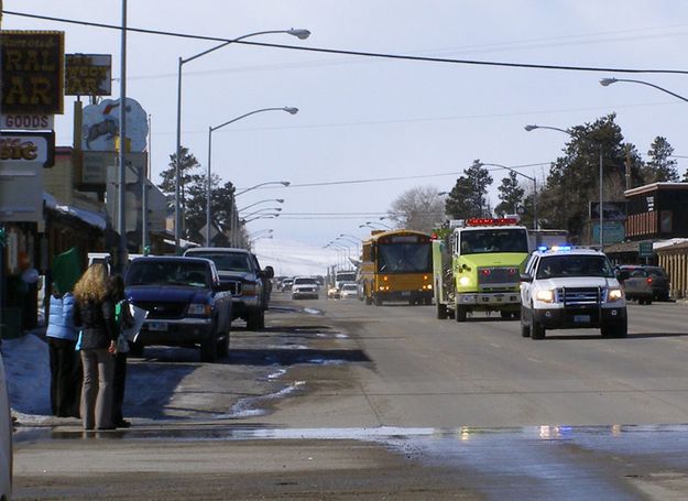 Escort through town. Photo by Sue Sommers, Pinedale Online.