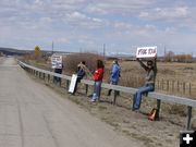 Signs on the highway. Photo by Sue Sommers.