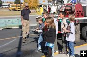 Spraying the fire hose. Photo by US Forest Service.