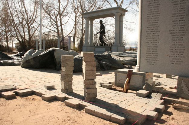 Laying Bricks. Photo by Dawn Ballou, Pinedale Online.