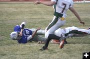 Fumble!. Photo by Jonathan Van Dyke, Pinedale Roundup.