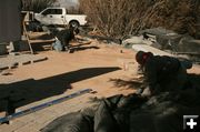 Smoothing for bricks. Photo by Dawn Ballou, Pinedale Online.