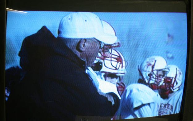 Coach Bill Lehr and team. Photo by Toyota Line of Scrimmage.