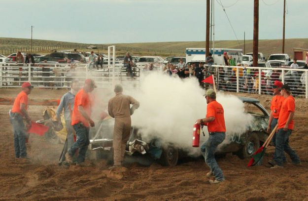 Putting out the fire. Photo by Dawn Ballou, Pinedale Online.