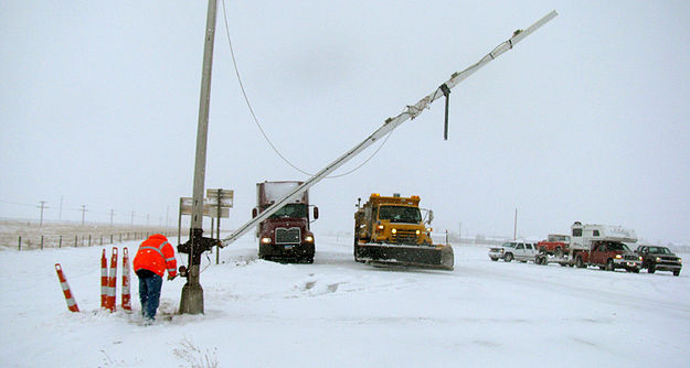 Opening the highway gate. Photo by Wyoming Department of Transportation (WYDOT).