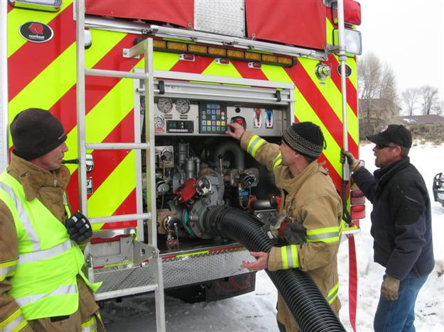 Checking the controls. Photo by T.J. Hunt.