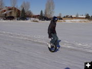 Nathan Stewart on unicycle. Photo by Craig Sheppard.