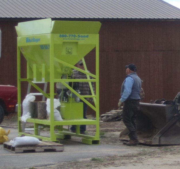 Sand bag filling machine. Photo by Bill Winney.