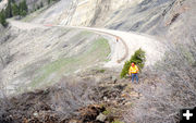 Inspecting the slide. Photo by Wyoming Department of Transportation.