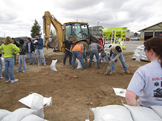 Filling sandbags. Photo by Bill Winney.