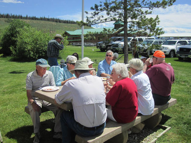 Enjoying the food. Photo by Bill Winney.