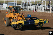 Hauling it off. Photo by Dawn Ballou, Pinedale Online.