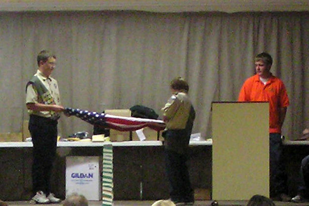 Folding the flag. Photo by Bob Rule, KPIN 101.1FM Radio.