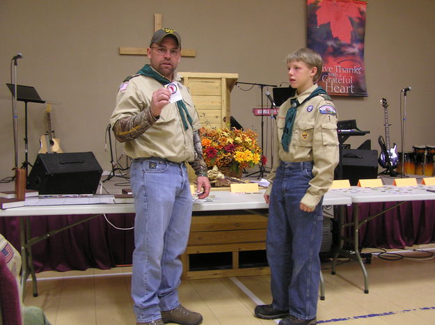 Earning Badges. Photo by Robert Lenz, Scoutmaster, Troop 1.