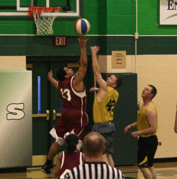 Grabbing for the ball. Photo by Dawn Ballou, Pinedale Online.