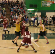 46 takes a shot. Photo by Dawn Ballou, Pinedale Online.