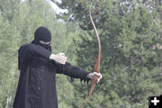 A soldier draws his bow. Photo by Tim Ruland, Pinedale Fine Arts Council.