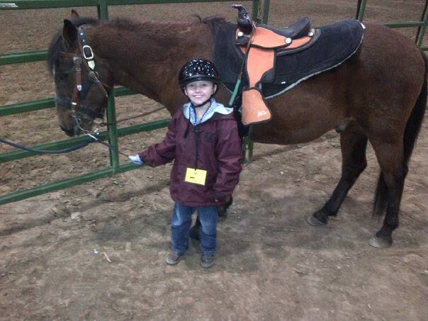 Ian getting ready. Photo by M.E.S.A. Therapeutic Horsemanship, Inc..