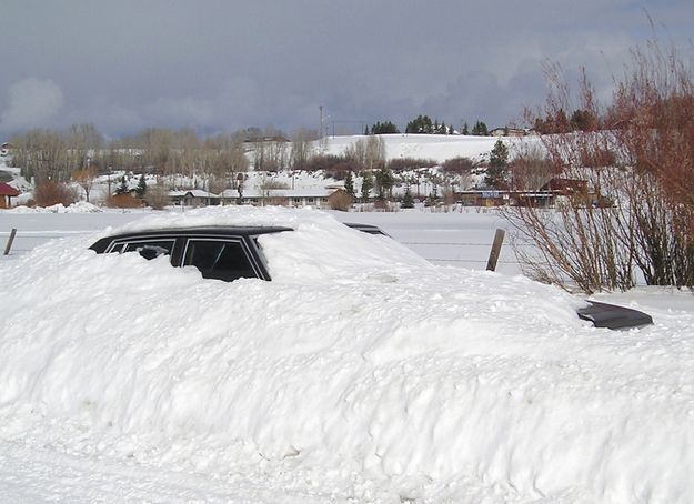 Buried car. Photo by Pinedale Online.