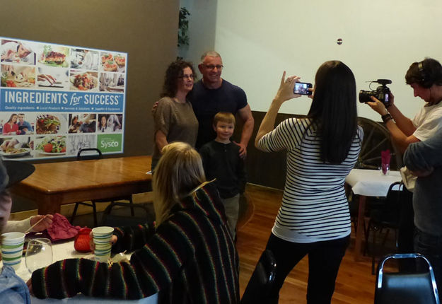 Posing for pictures with Chef. Photo by Dawn Ballou, Pinedale Online.