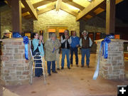 Cutting the ribbon. Photo by Dawn Ballou, Pinedale Online.