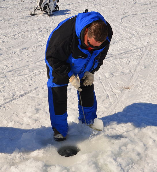 Scooping it out. Photo by Terry Allen.