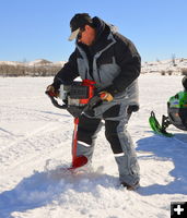 Making a hole. Photo by Terry Allen.