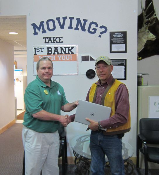 Laptop donation. Photo by Pinedale Lions Club.