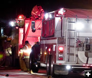 Putting hoses away. Photo by Dawn Ballou, Pinedale Online.