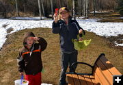 Keegan and Silas Share Candy. Photo by Terry Allen.