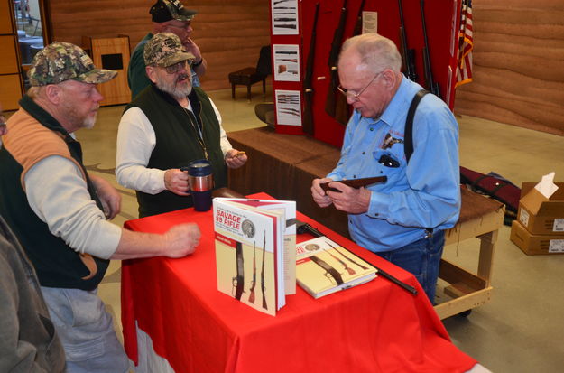 Gun talk. Photo by Terry Allen, Pinedale Online.