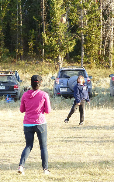 Throwing football. Photo by Dawn Ballou, Pinedale Online.