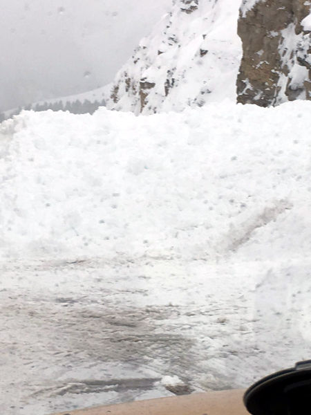 Snow across the highway. Photo by WYDOT.