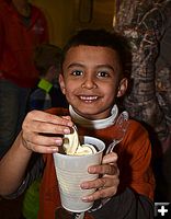 Yeriel Gets an Ice Cream Cup. Photo by Terry Allen.