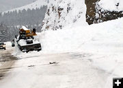 Working to clear the road. Photo by WYDOT.