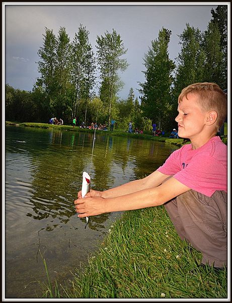 Reality Up Close at the Kids Fishing Derby. Photo by Terry Allen.