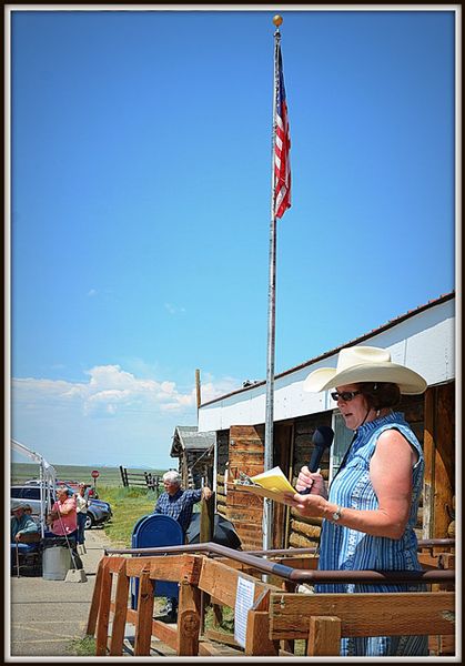 Ann Reads the History. Photo by Terry Allen.