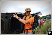 Ryan Tollison Packs His Kayak. Photo by Terry Allen.